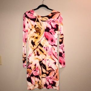 Stunning Long Sleeved, Low Back Mini Dress